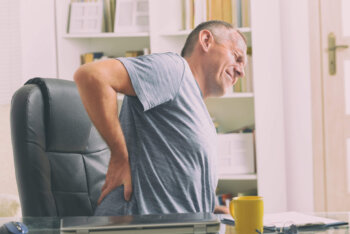 Man suffering from low back pain