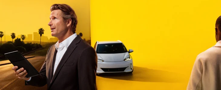 A Los Angeles Uber and Lyft accident lawyer with a car and city skyline.