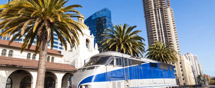 A train stopped at a California station, representing the importance of contacting a train injury lawyer after a rail-related accident.