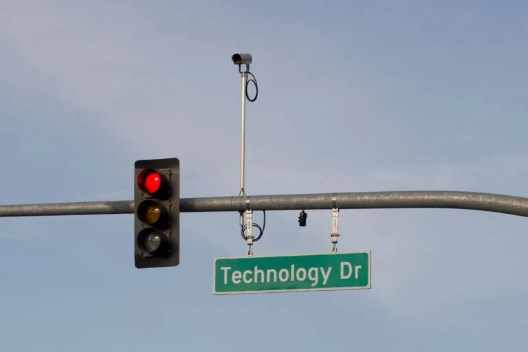 A red light traffic camera watches over an intersection in San Jose, connecting to questions about how a red light camera in California can assist after a crash.