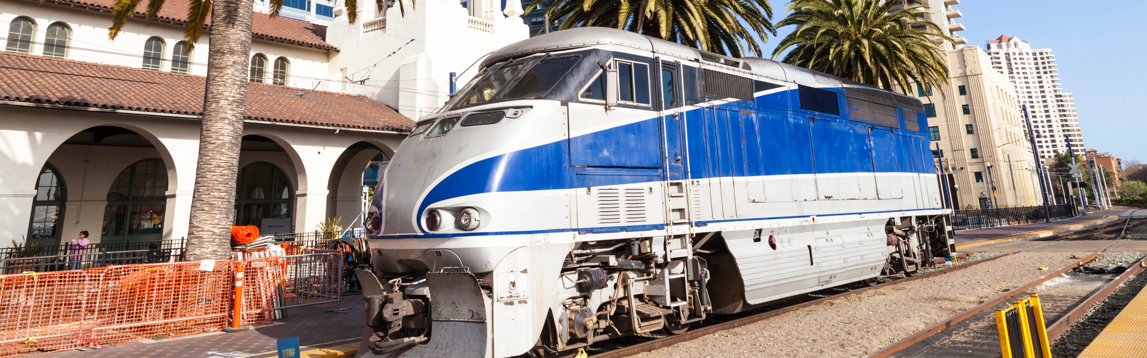 A train stopped at a California station, representing the importance of contacting a train injury lawyer after a rail-related accident.